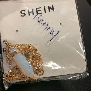 This is a perl white stone necklace